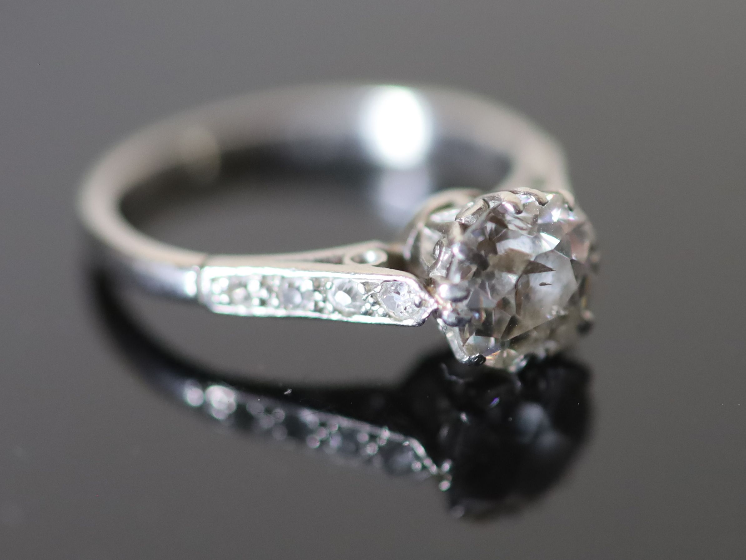 A mid 20th century white gold and single stone diamond ring,